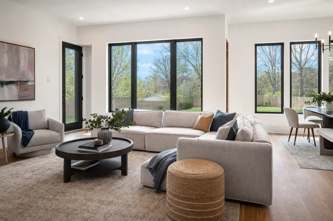 A bright, balanced real estate photo of a modern living room
